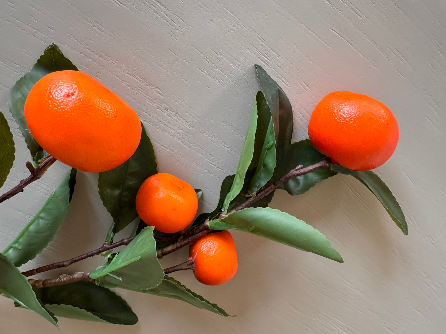 Künstiliche Orangen Zweige